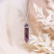 Amethyst point pendant on 18 inch 925 Silver chain.